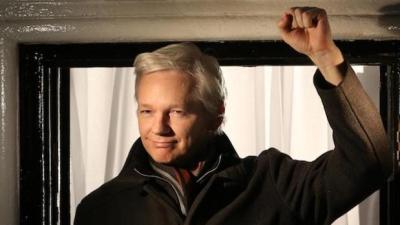 Michael Moore Helps Julian Assange Post Bail