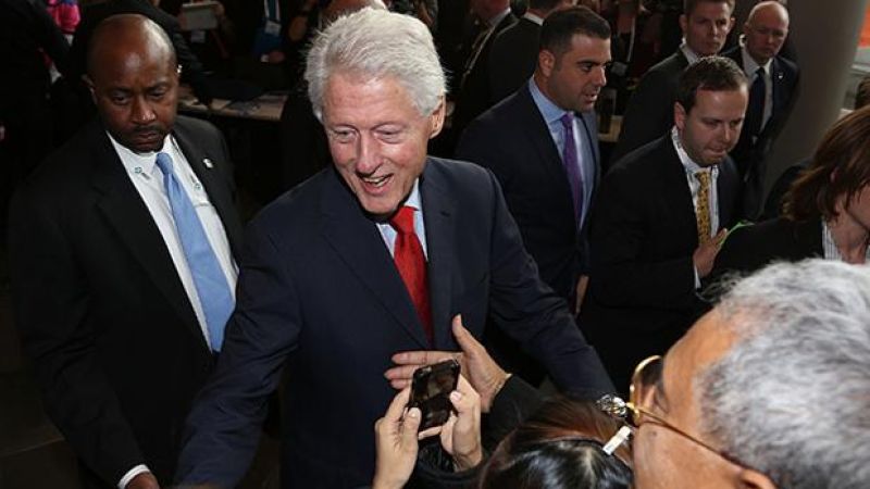 Protesters Interrupt Bill Clinton During AIDS Conference Speech