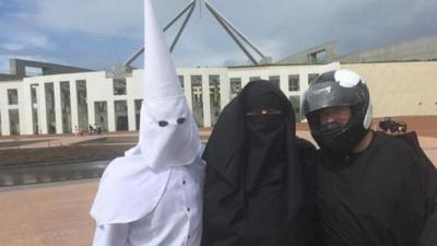 Men Dressed In A Niqab, A Bike Helmet, And A KKK Hood Tried To Enter Parliament