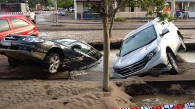 Furious Earth Opens Sinkhole To Accept Sacrificial Offering Of Automobiles