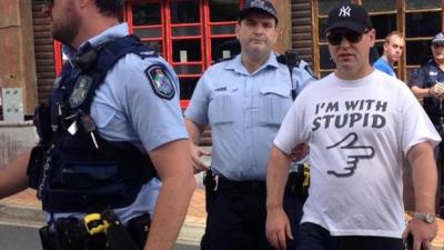 QLD Police Arrested A Man For Wearing A Shirt Near Political Campaigners