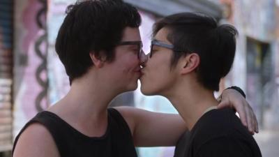 Ad Board Smacks Down Complaints About Same-Sex Smoochin’ In Medibank Ad