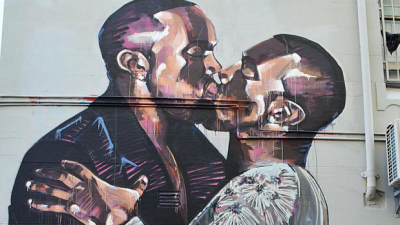 Kanye Finally Gets On Kim’s Level, Cops His Own Massive Mural In Sydney