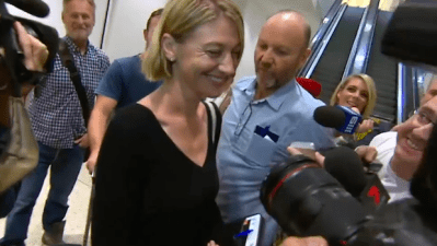 WATCH: ’60 Minutes’ Crew Arrive At Sydney Airport To Massive Media Mob