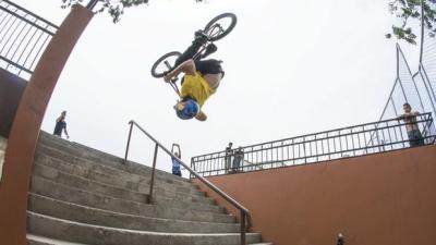 WATCH: Bloke Pulls Off Insane BMX Backflip Down Stairs Like It’s No Biggie