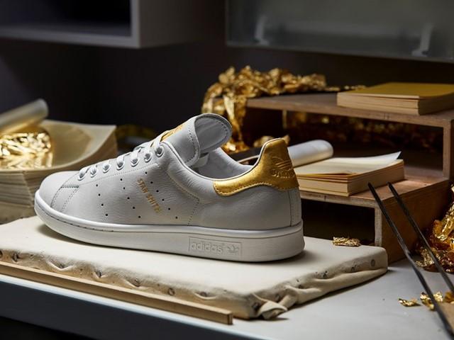 Bored Of Your White Stan Smiths? These Dipped-In-Gold Babies Drop Friday
