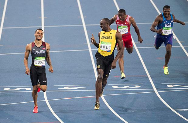 Usain Bolt & Andre De Grasse Ran A PB For BFFs In Ultra-Cute 200m Semi