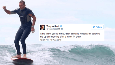 Tony Abbott’s Latest ‘On Water Matter’ Is Getting Clobbered By A Surfboard