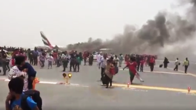 WATCH: Insane Footage From Blazing Emirates Plane Shows Passengers Fleeing