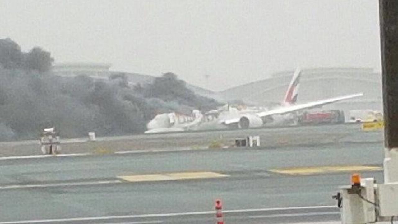 Plane Catches Alight After Crash-Landing At Dubai International Airport