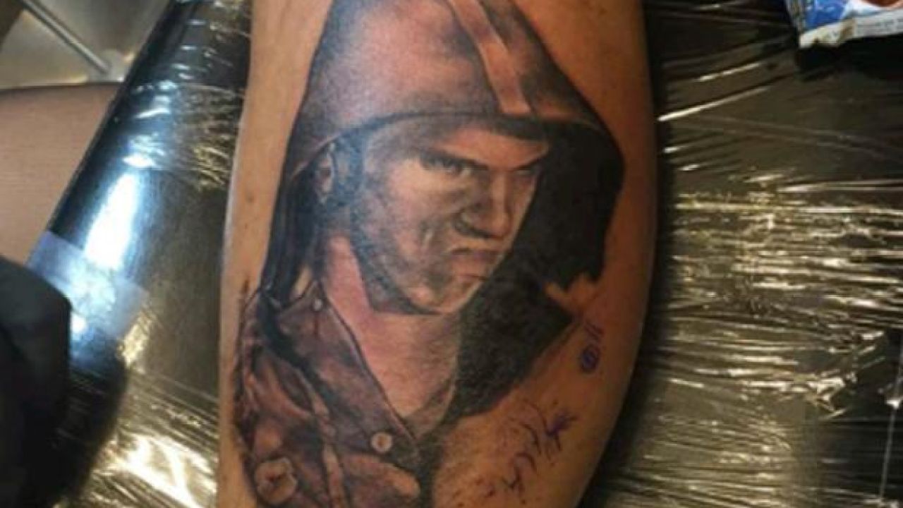 Holy Shit, Someone Legit Got That Michael Phelps Face Inked On Their Leg