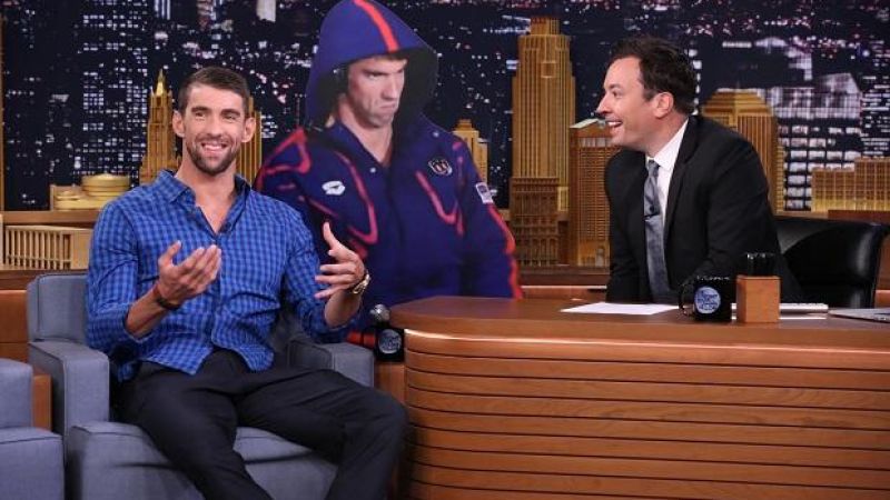 WATCH: Michael Phelps Gets A Life-Size Cutout Of His Iconic Rio Stankface
