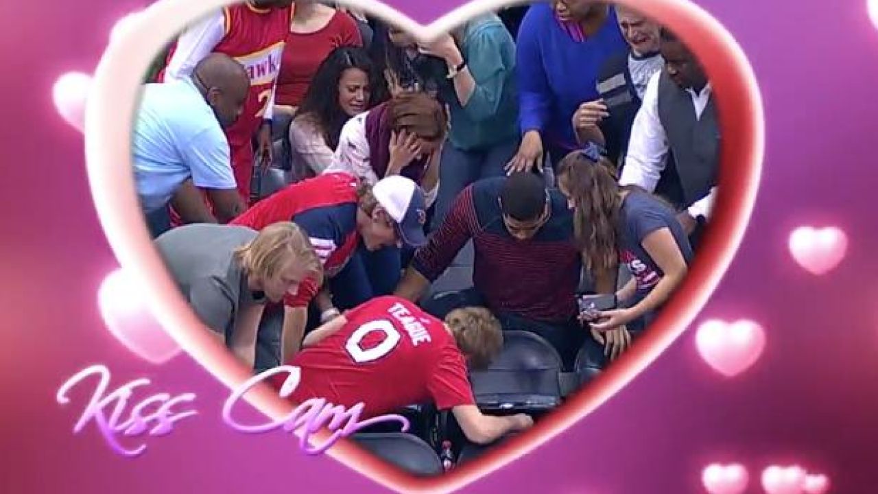 WATCH: ~Very Real~ Kiss Cam Proposal Goes Spectacularly, Incredibly Wrong