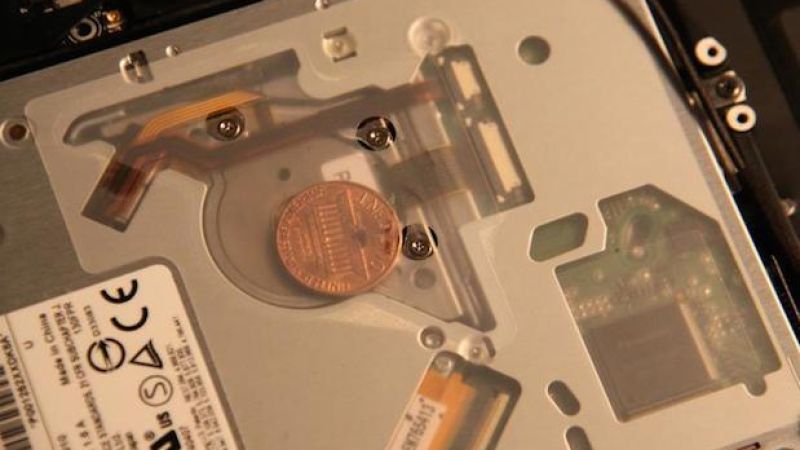 People Are Finding Coins Hidden Inside Their MacBooks & It’s A Tech Mystery