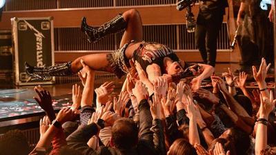 Lady Gaga Crowd Surfed To Metallica At The Grammys & Nailed The Landing