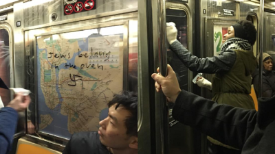 NYC Commuters Stripping A Subway Car Of Nazi Bullshit Is Today’s Good Vibe