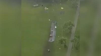 WATCH: Mad Dog QLDers Made A Slippery Dip In The Middle Of Today’s Fkd Rain