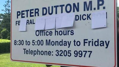 QLD Students Do Rude Edits To Peter Dutton’s Sign In Asylum Seeker Protest