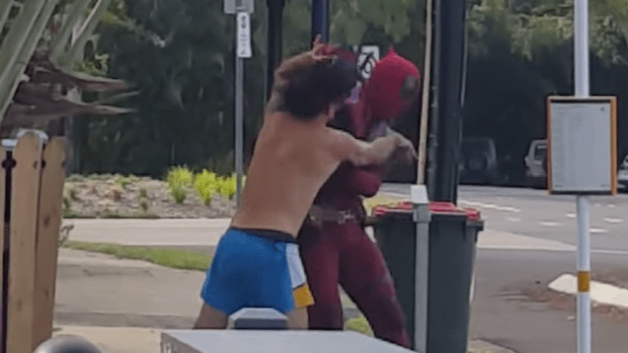 Here’s A Shirtless Man Fighting Deadpool At A North Queensland Bus Stop