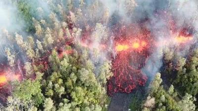 Insane Footage Shows Lava Spewing Into Street After Hawaii Volcano Eruption