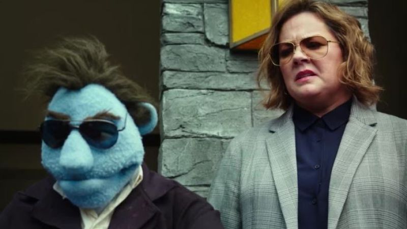 Melissa McCarthy’s New Flick Is Full Of Drugs, Action & Thirsty Puppets