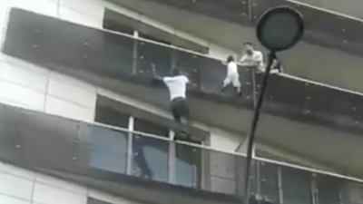 Please Observe This Total Champ Saving A Baby Dangling Off A Paris Balcony