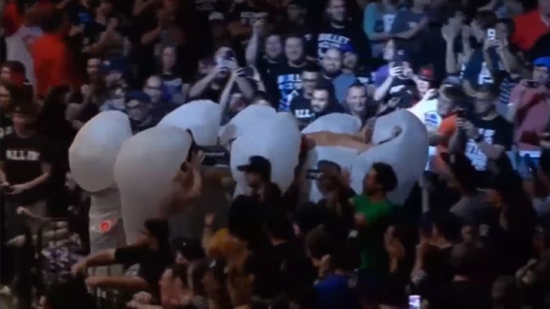 Here’s A Man Being Carried Away By Giant Penises Because Pro-Wrestling Rules