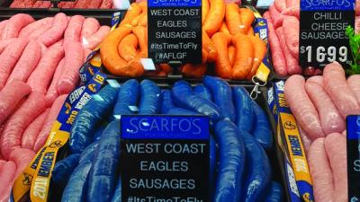A WA Butcher Has Made Unholy Blue & Yellow Eagles Snags For The Grand Final