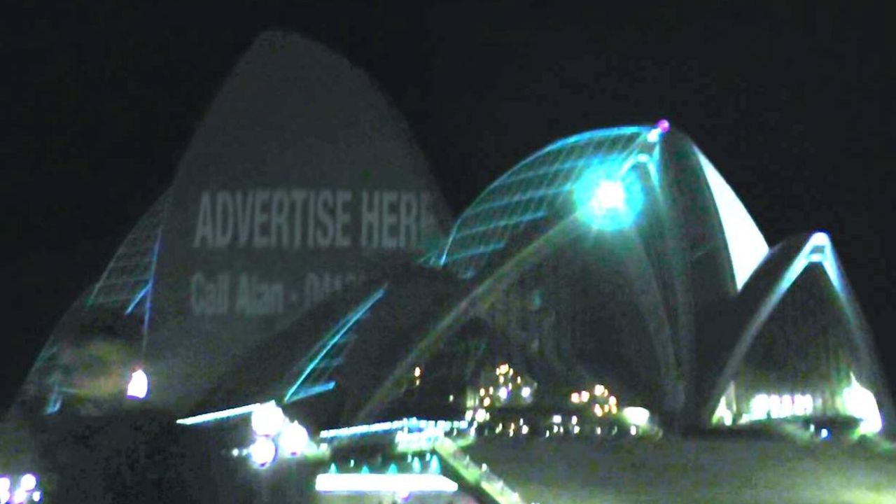 Here’s The Chaser Projecting Alan Jones’ Phone Number On The Opera House