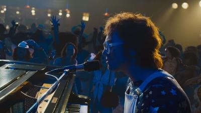 Watch Taron Egerton Sing ‘Rocket Man’ In 1st Trailer For Elton John Biopic