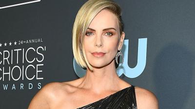 Charlize Theron Debuts Brown Hair At The Oscars, Is Now Irina Shayk’s Twin