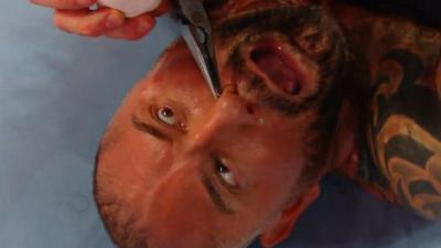 Watch Dave Batista Get His Nose Ring Ripped Out With Pliers At WrestleMania