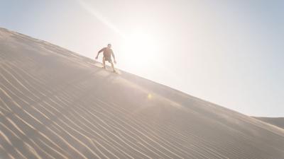Where To Go In Queensland If You Want To Give Sand Boarding A Red Hot Go