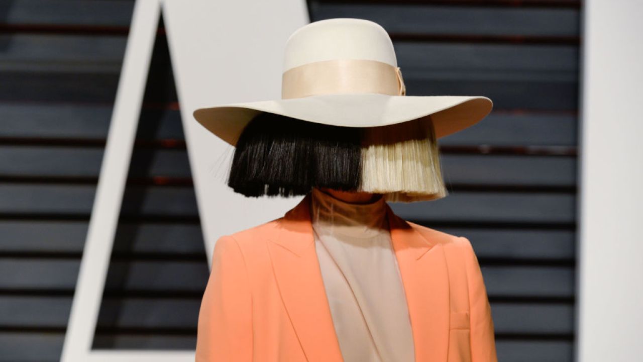 Pop Queen Sia Shares Her Chronic Pain Story & Reveals Neurological Disease Diagnosis