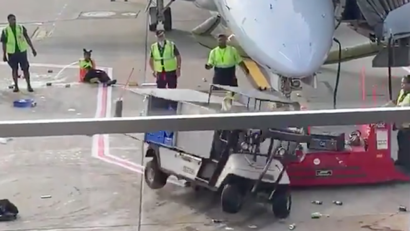 Please Enjoy This Airport Cart Catastrophically Spiraling Out Of Control, Much Like Your Life