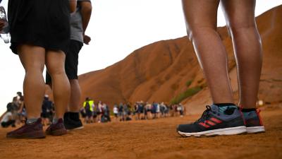 Scores Of Clowns Have Lined Up Before Sunrise For One Last Legal Uluru Climb
