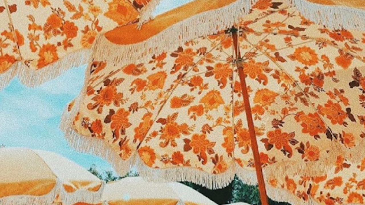Here’s Where To Buy Those Incred Vintage-looking Beach Umbrellas Popping Up Everywhere ATM