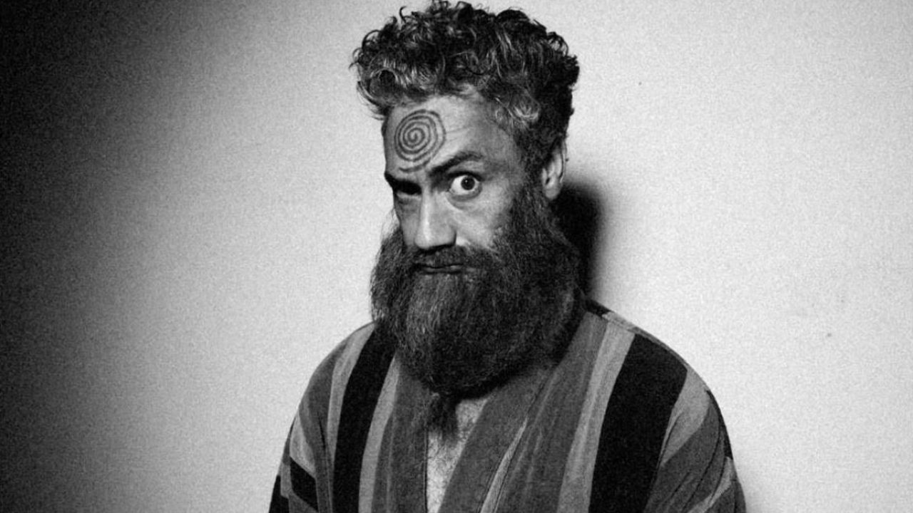 Taika Waititi Stars As A Deranged Cult Leader In New Black Comedy & Alright, I’ll Join