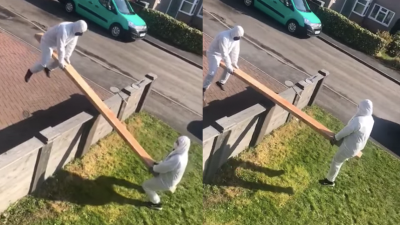 Two Neighbours, Still Keen To Hang Out At A Responsible Distance, Created This Handy DIY Seesaw