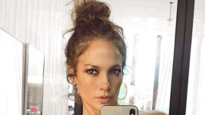 J.Lo Fans Have Spotted A Random Man Hiding In The Background Of Her Selfie & Is This ‘Parasite’ IRL?