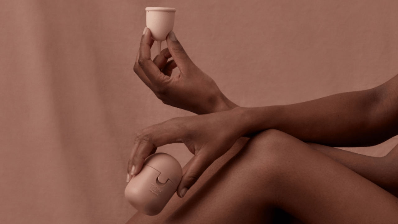 TOM Organic’s New Reusable Period Cup Comes With A Nifty Microwaveable Sterilising Container
