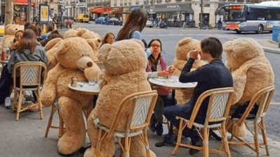 I Tip My Beret To This Paris Café For Using Giant Teddy Bears To Enforce Social Distancing