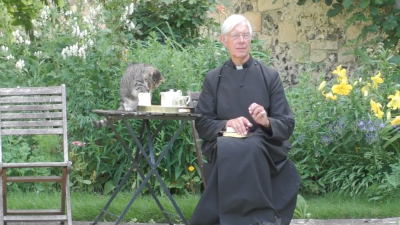 Minister’s Cat, On The Road To Hell, Nabs Milk During Live Morning Prayer Broadcast