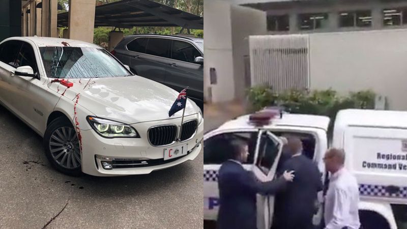 Refugee Protesters Threw Red Paint On Scott Morrison’s Car & Forced A Dramatic Police Escape