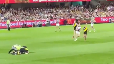 Two YouTubers Interrupted The First AFL Grand Final In Brisbane By Running Onto The Field