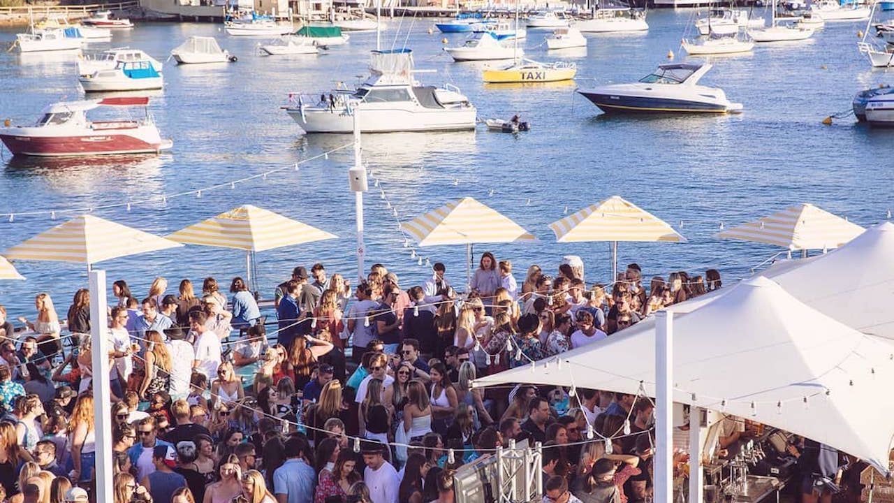 The DJ From Manly Wharf Bar Has Created A Two-Hour Pre-Bevs Playlist & It’s Non-Stop Bangers