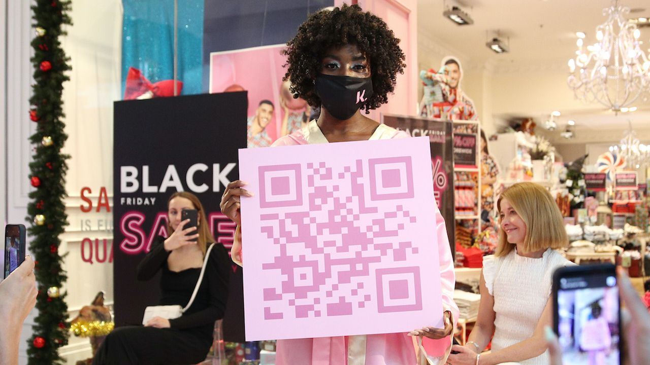 In Peak 2020 Fashion News, Klarna Sent Models Down A Runway In Nothing But A Robe & A QR Code