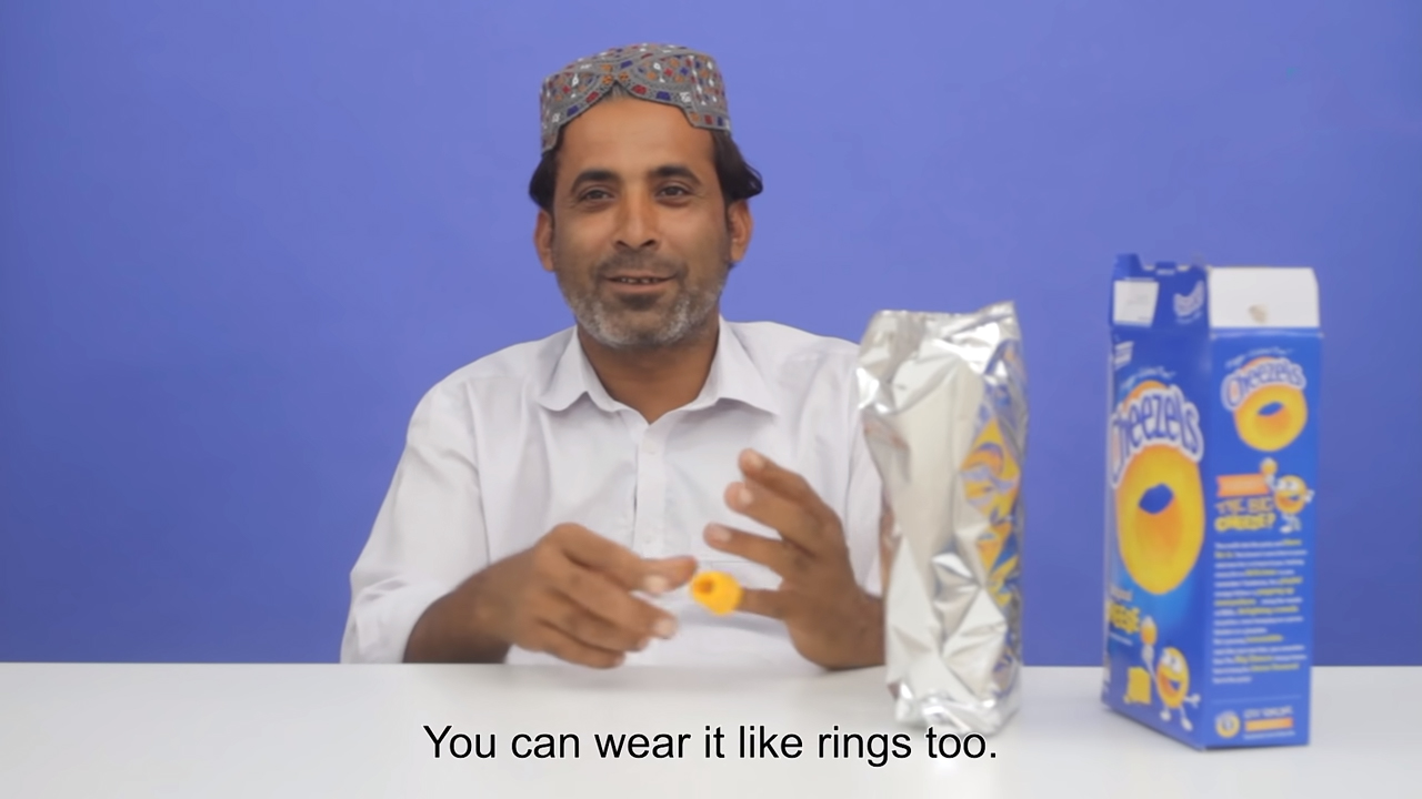 Watch These Pakistani Tribal People Froth Aussie Snacks & Drag Us For Excessive Packaging