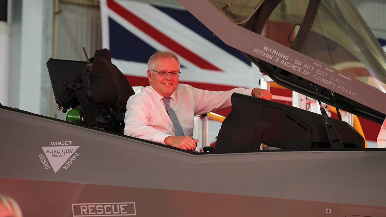 The PM’s Own Press Conference Had To Awkwardly Play Danger Zone Twice After He Rocked Up Late