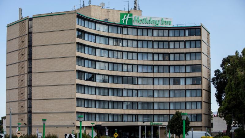 Returned Traveller Blamed For The Holiday Inn Cluster Says He’s Been Treated ‘Like A Criminal’